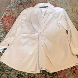 Perfect white button down, with twist in the back